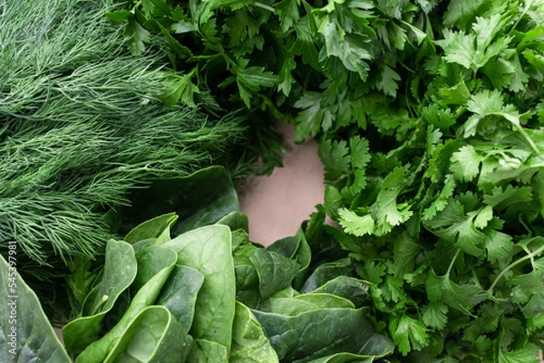 Fototapeta Autumn harvest. Greens and vegetables frame. to cook. Grocery background. Health food. Vegetarian. View from above. Place for text.