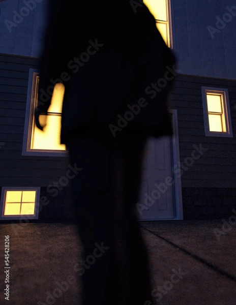 Fototapeta Lone man in suit stands by an illuminated house at dusk. Rear view. 3D render.