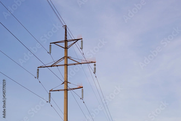 Fototapeta power line tower with blue sky background