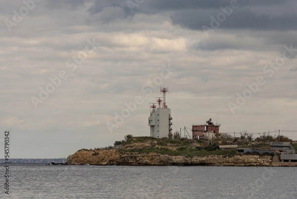 Obraz The Center for regulating the movement of ships in Sevastopol. Autumn in Sevastopol on the shore.