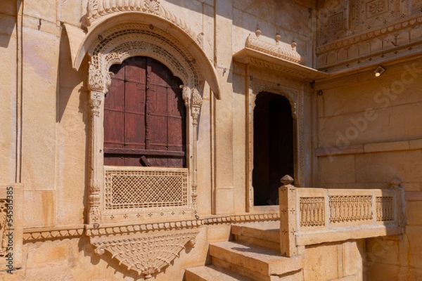 Fototapeta Sandstone made beautiful balcony, jharokha, stone window and exterior of Rani Mahal or Rani Ka Mahal, inside Jaisalmer fort. Rajasthan, India. UNESCO World heritage site