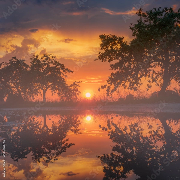 Fototapeta sunset reflection