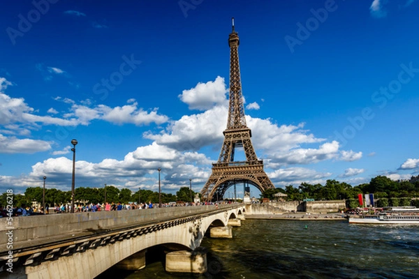 Fototapeta Eiffel Tower and Seine River with White Clouds in Background, Pa