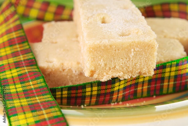 Obraz Three shortbread fingers with tartan ribbon