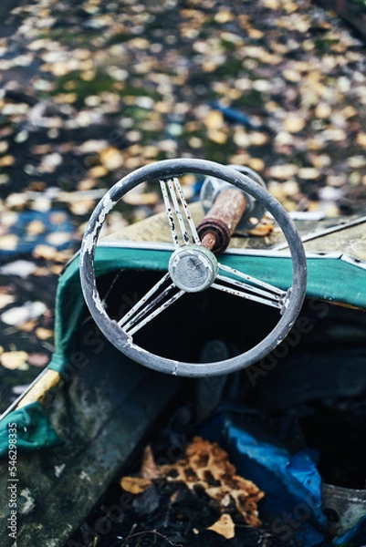 Fototapeta Abandoned Amusement Car Ride in Ghost City of Pripyat in Chernobyl Exclusion Zone, Scooter in Autumn Colors