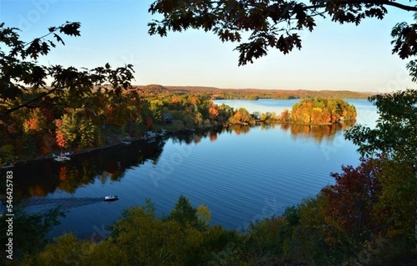 Fototapeta The beautiful landscapes of Muskoka, Ontario, Canada during Fall season, full of colorful autumn colors all over the place