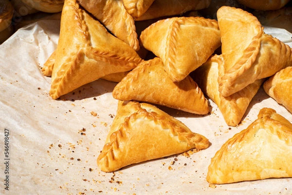 Obraz Triangular Tatar pie echpochmak stuffed with potatoes and meat, national Tatar pastry