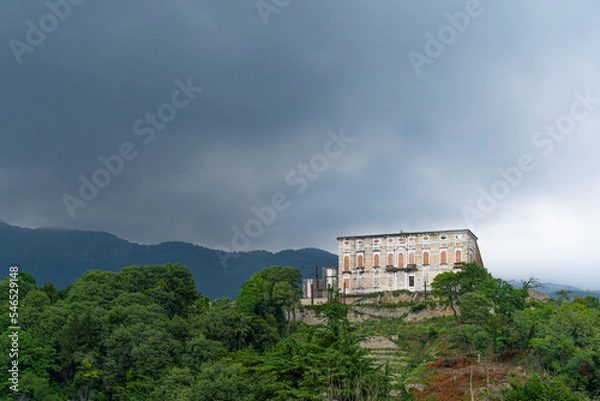 Fototapeta An abandoned castle on top of a forest hill in Aviano, Italy