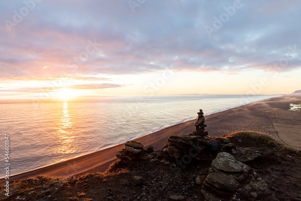 Obraz Stacked rocks at the beach during sunset