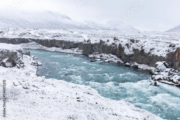 Fototapeta River leading to Godafoss in the snow