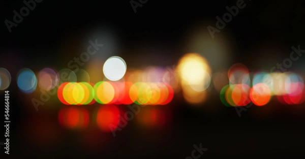 Fototapeta Multicolor defocused bokeh lights in the night background, abstract light bokeh background.                              