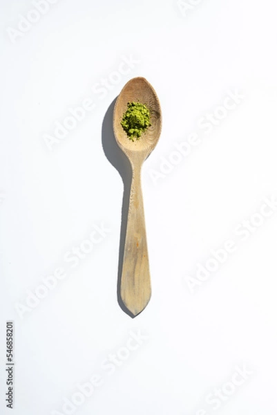 Obraz Wooden spoon on white background