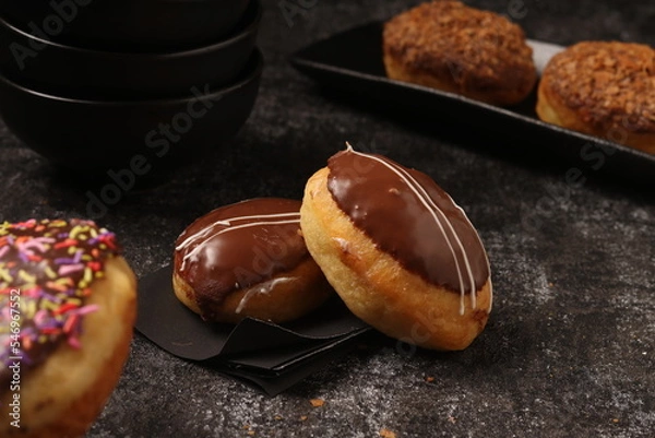 Fototapeta Delicious donut on a consistent ground and a distinctive product