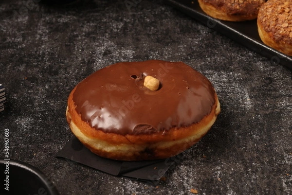 Fototapeta Delicious donut on a consistent ground and a distinctive product