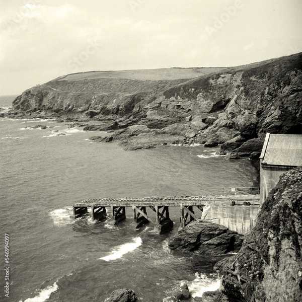 Fototapeta Old lifeboat station and cliff path on the Lizard Point, Cornwall