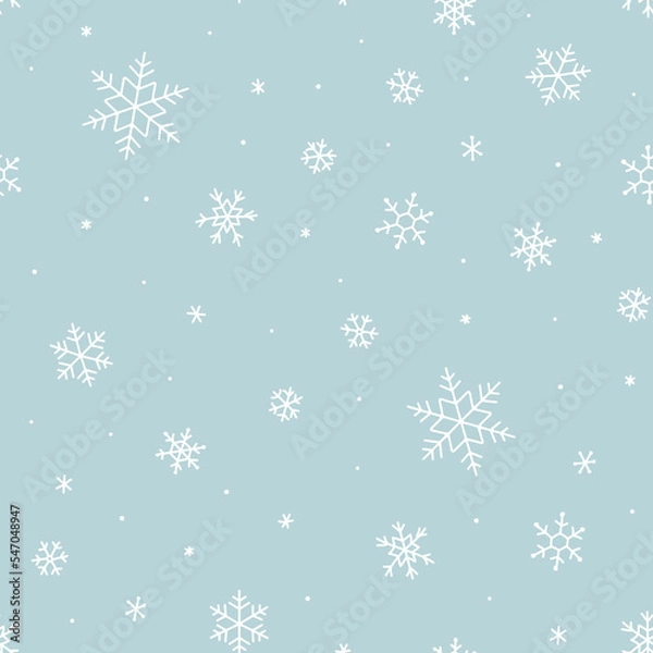 Fototapeta Snowy winter seamless pattern of hand drawn snow flakes on light blue background