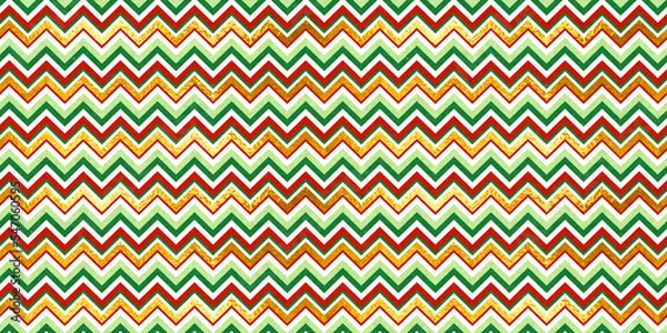 Fototapeta Red and green vintage craft textured seamless chevron zigzag stripes Christmas pattern with shiny gold foil decoration. Retro herringbone xmas card background, winter holiday backdrop, wrapping paper.