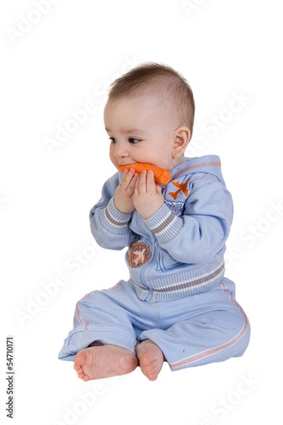 Obraz Smiling baby eats carrot
