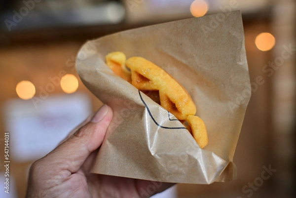 Obraz ワッフルを食べ歩きする