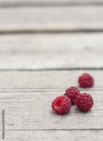 Fototapeta fresh raspberry on wooden table