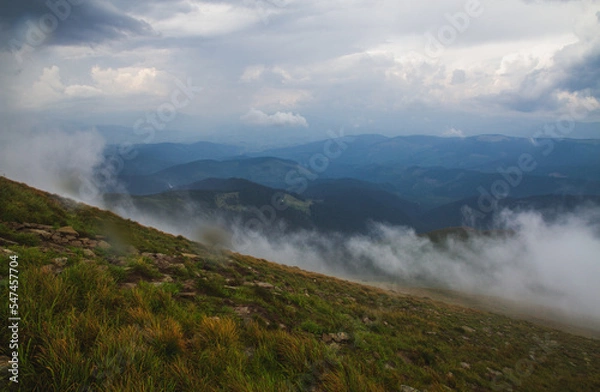 Obraz Beautifull over clouds view of Chornohora highest mountain range in Western Ukraine after the storm.