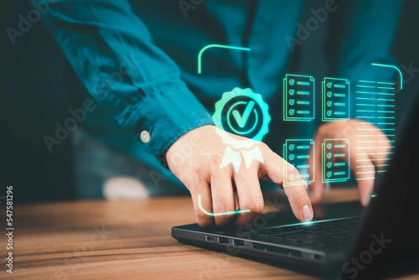 Fototapeta Businessman working with sign of the top service quality assurance on virtual screen. Guarantee, Standards, ISO certification and standardization concept.