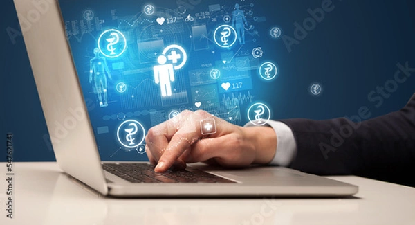 Fototapeta hand browsing on the internet for medical issues