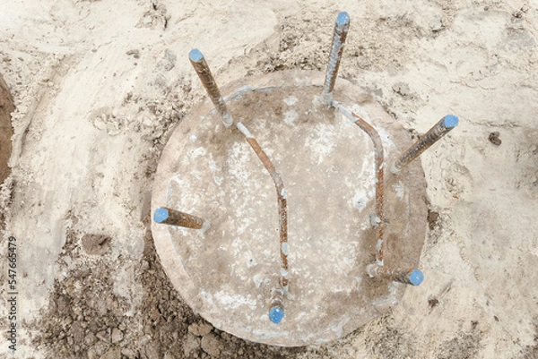 Obraz Construction works. Pile foundation after completed. Before pile cap pile heads. Reinforced concrete piles of the new building. Concrete pile foundation for new construction site top view.