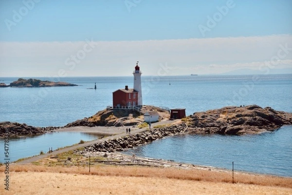 Obraz Lighthouse at sunset landscape