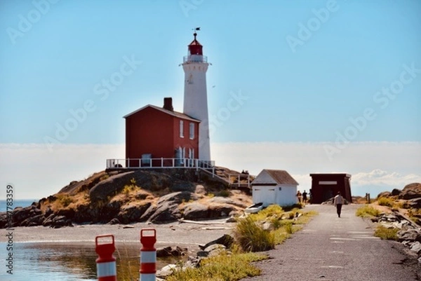 Obraz Lighthouse at sunset landscape