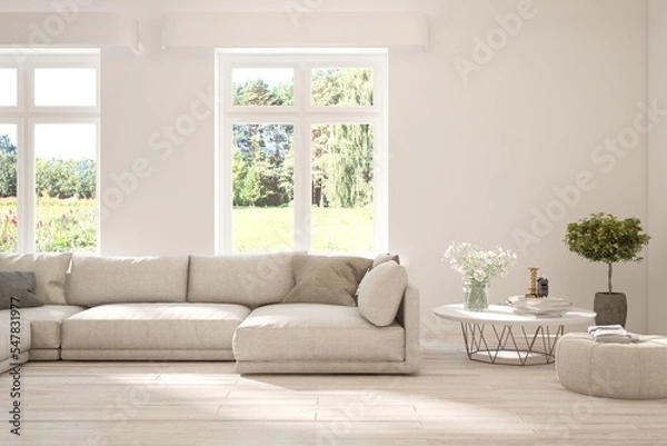 Fototapeta White living room with sofa and summer landscape in window. Scandinavian interior design. 3D illustration