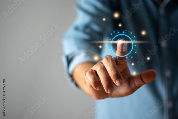 Obraz Man scans finger through touch screen