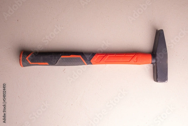 Obraz Locksmith's hammer with a plastic handle. Joiner's hand tool.