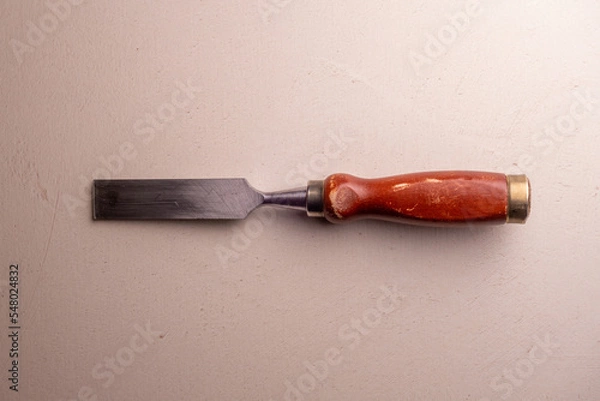 Obraz Chisel with wooden handle. Joiner's hand tool.