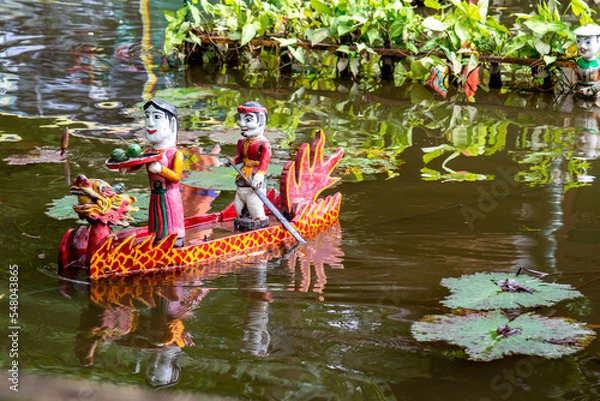 Fototapeta Vietnam, Hanoi, Water puppet show in public garden.