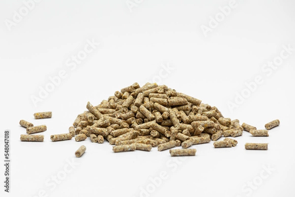 Fototapeta Fraction of feed additives for animals on a white background in the form of a pyramid