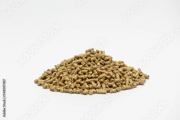 Fototapeta Fraction of feed additives for animals on a white background in the form of a pyramid