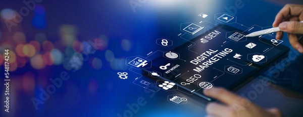 Fototapeta Digital marketing business technology banner web with copy space. Website adertisement email social media network, SEO, SEM video and mobile application icons in virtual screen.