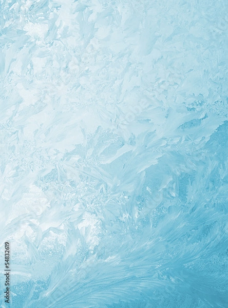 Obraz Wzory na szklance w mroźnym zimowym dniu. Świąteczne tło