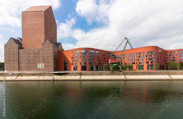 Obraz inside port with crane and curved building