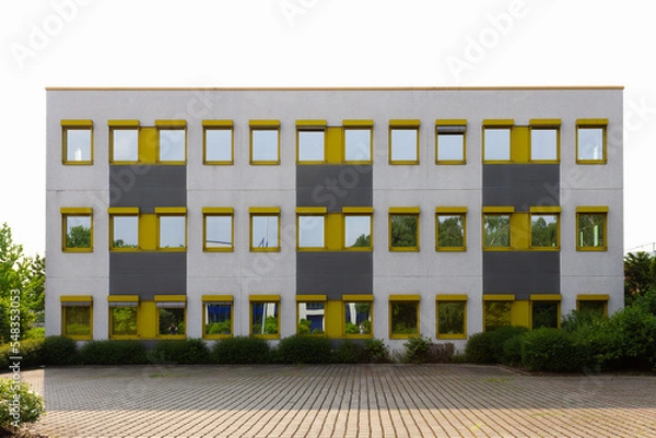 Obraz building with yellow window frames
