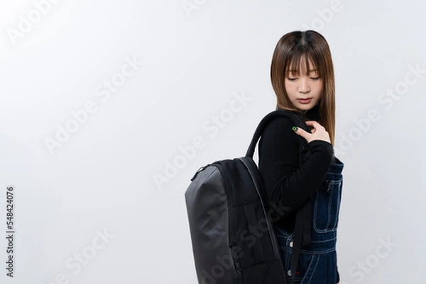 Obraz バックパックを持った女性