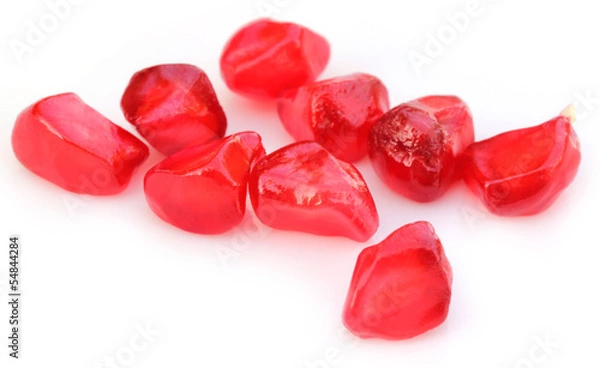 Fototapeta Pulp of pomegranate over white background