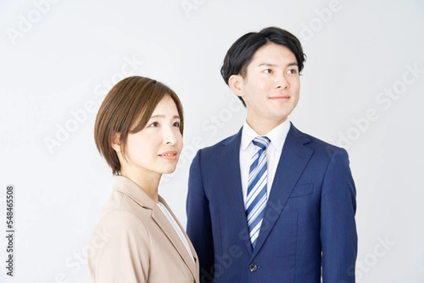 Fototapeta ビジネスウーマンとビジネスマンのポートレート　白背景