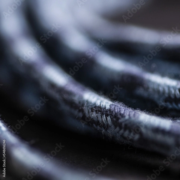 Obraz Blue Grey Braided Cable on Black Background