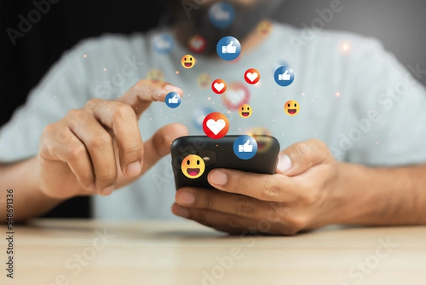 Fototapeta Online digital communication connection information with mobile phone. man using smartphone with social media icons. social media online concept.