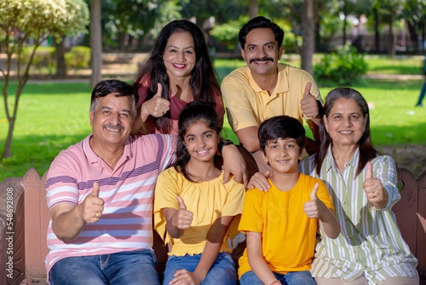 Fototapeta Happy indian or asian family at park