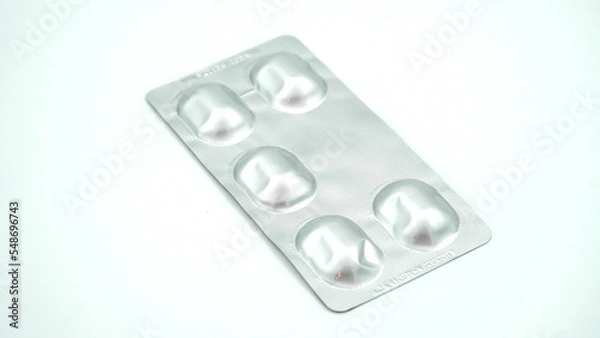 Fototapeta Inner packaging of a capsule antibiotic on a white isolated background