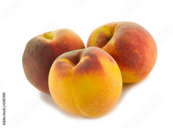 Fototapeta three full peaches isolated on white background