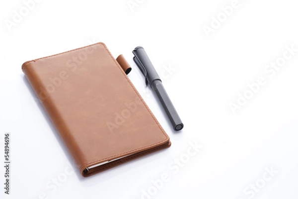 Fototapeta 白背景に手帳とペン